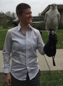 Katie Lynch, holding a hawk.