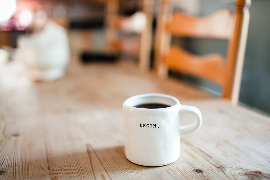 A coffee cup with the word 