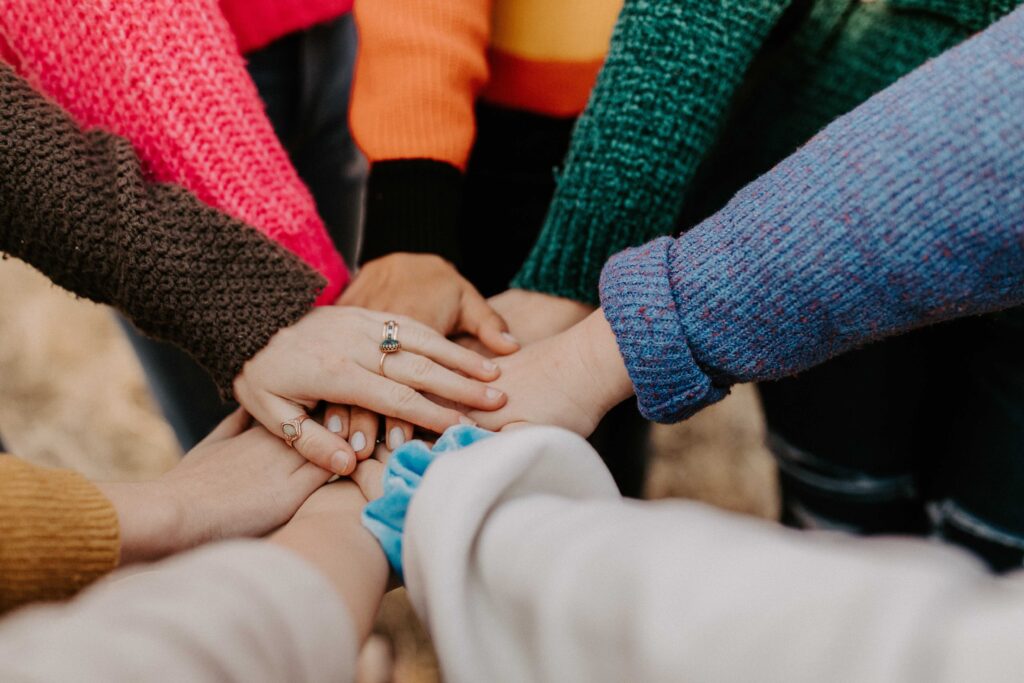 Hand meet together in a sign of teamwork.