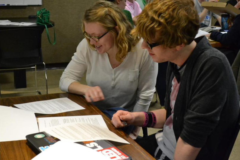 Transylvania University staffer with student at outreach event