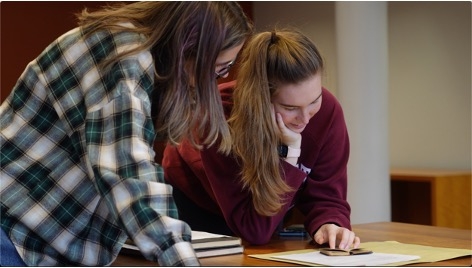 Two WAs working on the CWP history project look at archival materials during a visit to Lafayette College’s special collections